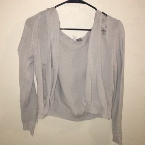 Distressed off-white sweater
